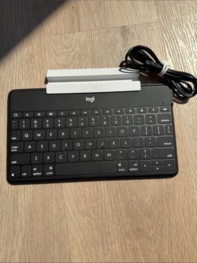 Logitech Black Compact Tablet Keyboard with White Dock Accent